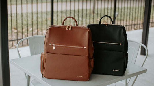 Two faux leather diaper bags