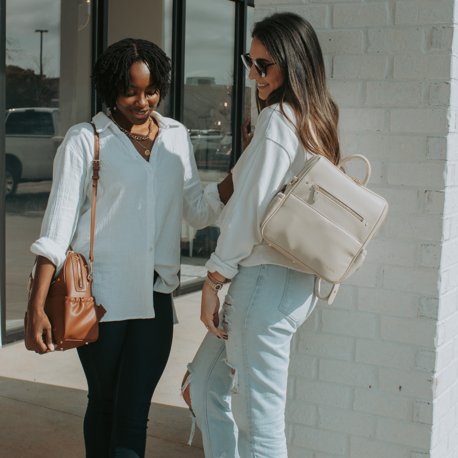 two women with yuuma mini bags - yuuma collection