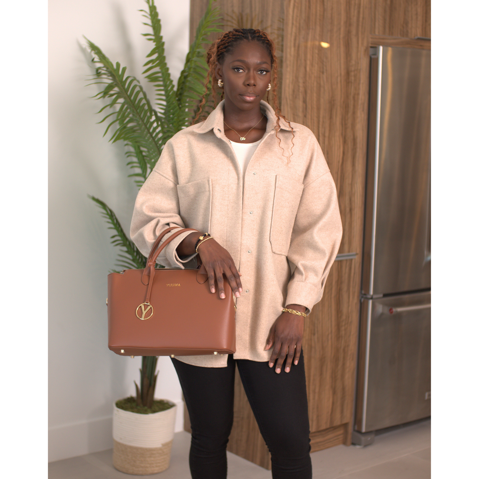 black woman with brown tote bag - yuuma collection