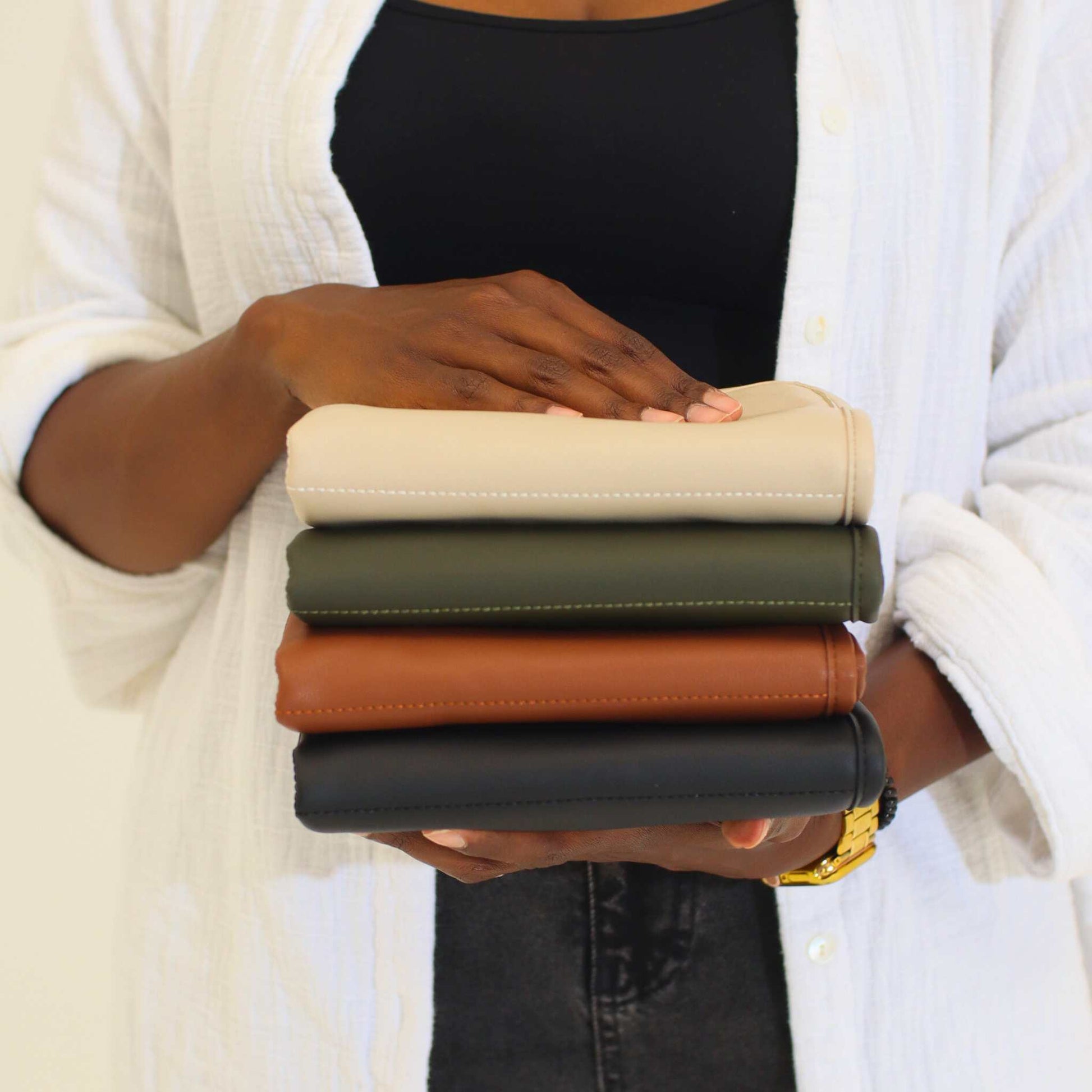 woman holding changing pads