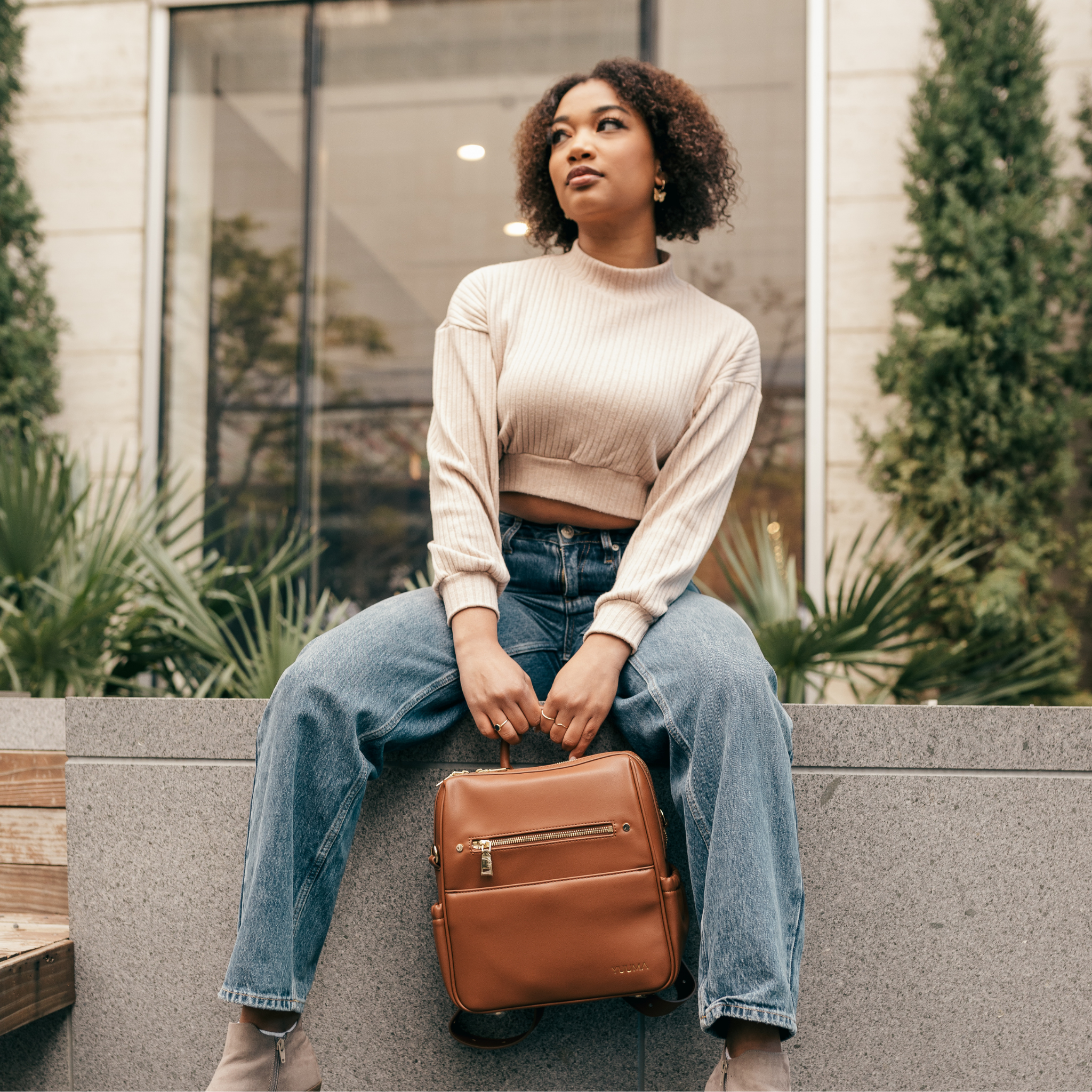 woman with yuuma mini bag in brown