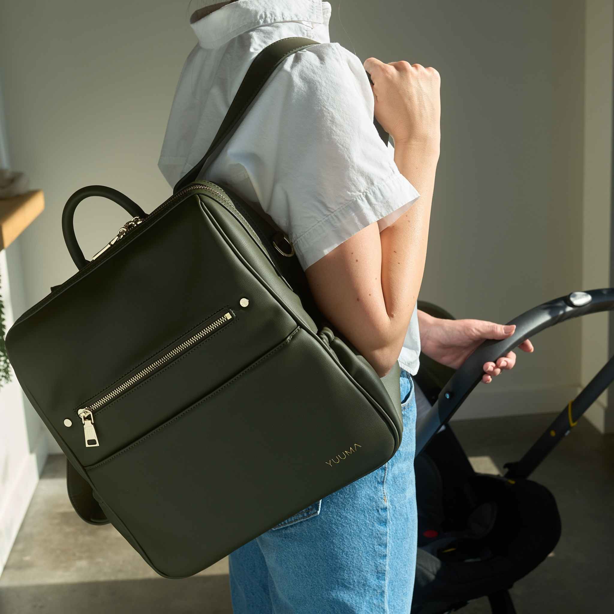 woman with olive green bag - yuuma